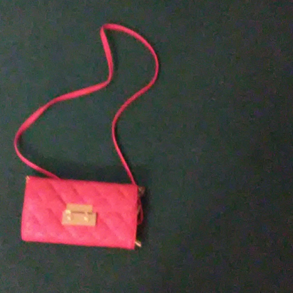 A pink strap bag